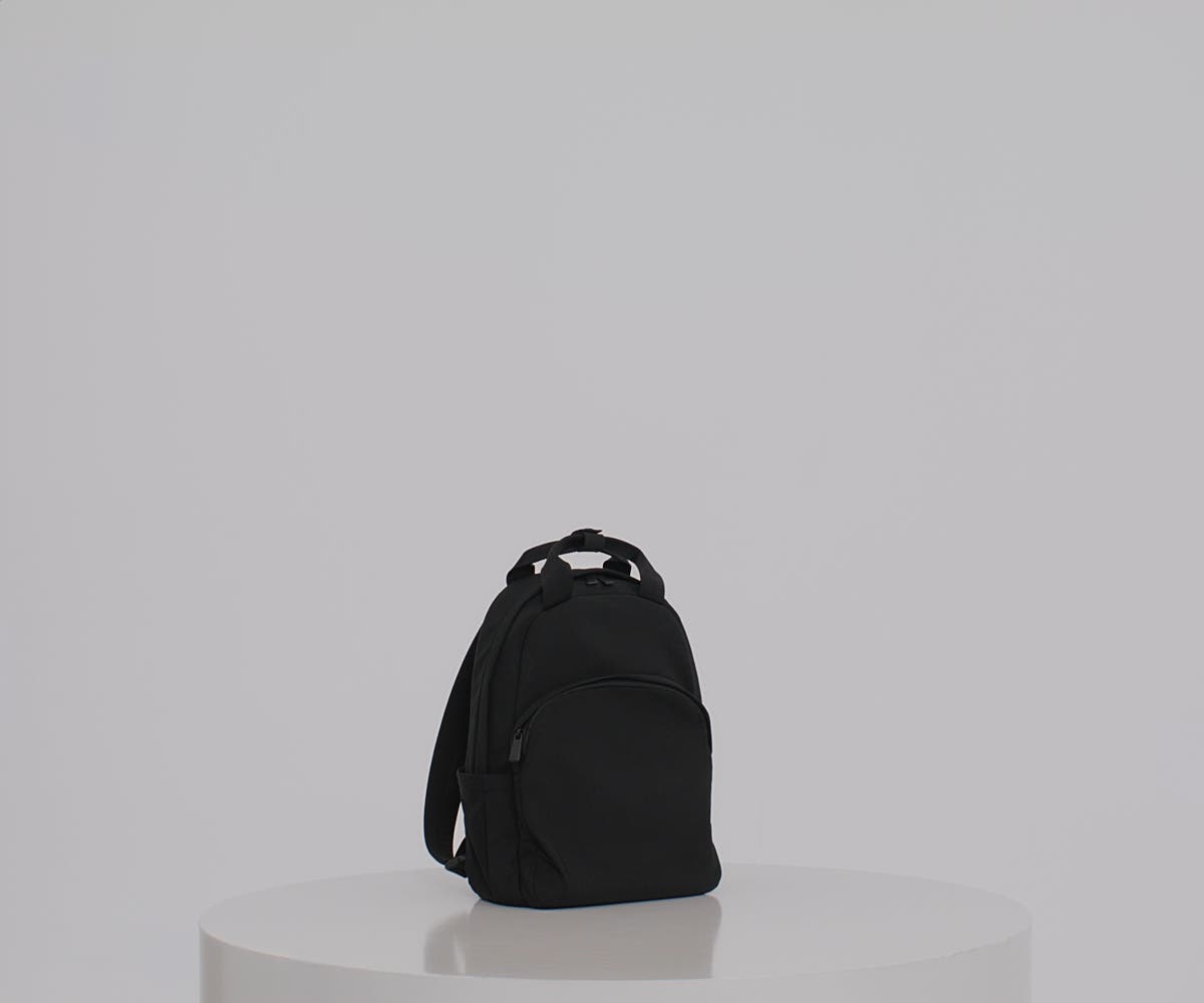 Featherlight Backpack in Clay Pink